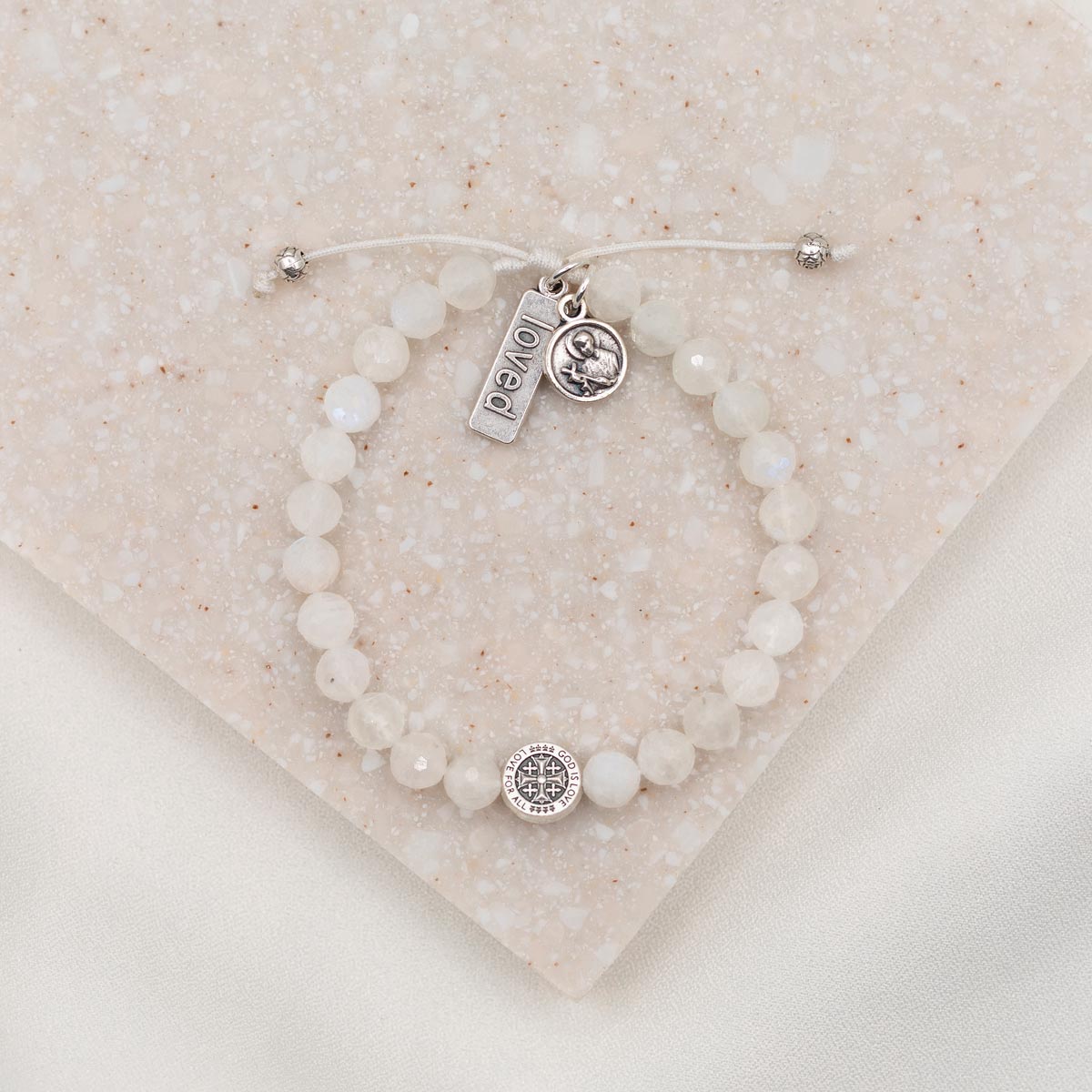 St. Amos Share the Love John Stamos Caitlin McHugh Fertility Blessing Bracelet Moonstone Gemstones St. Gerard Loved Charm Tag Medal Handwoven Cord