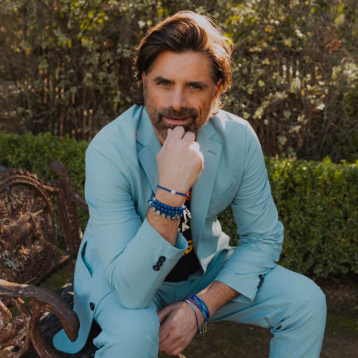 John Stamos in Share the Love My Saint My Hero Blues gemstone bracelets