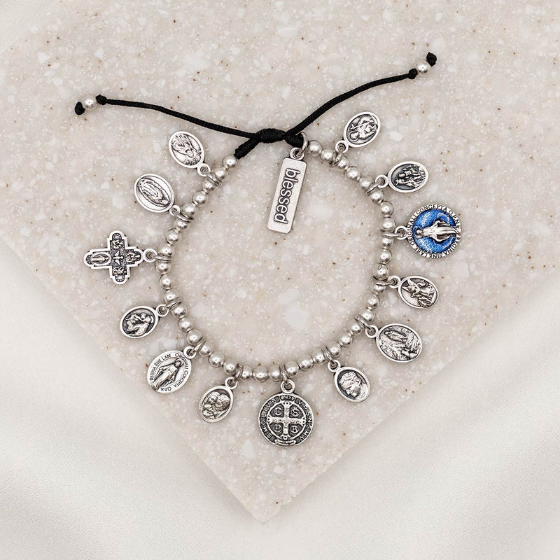 Glory Saints & Angels Bracelet silver tone saint medal charm bracelet on black slip knot cording with blessed charm tag