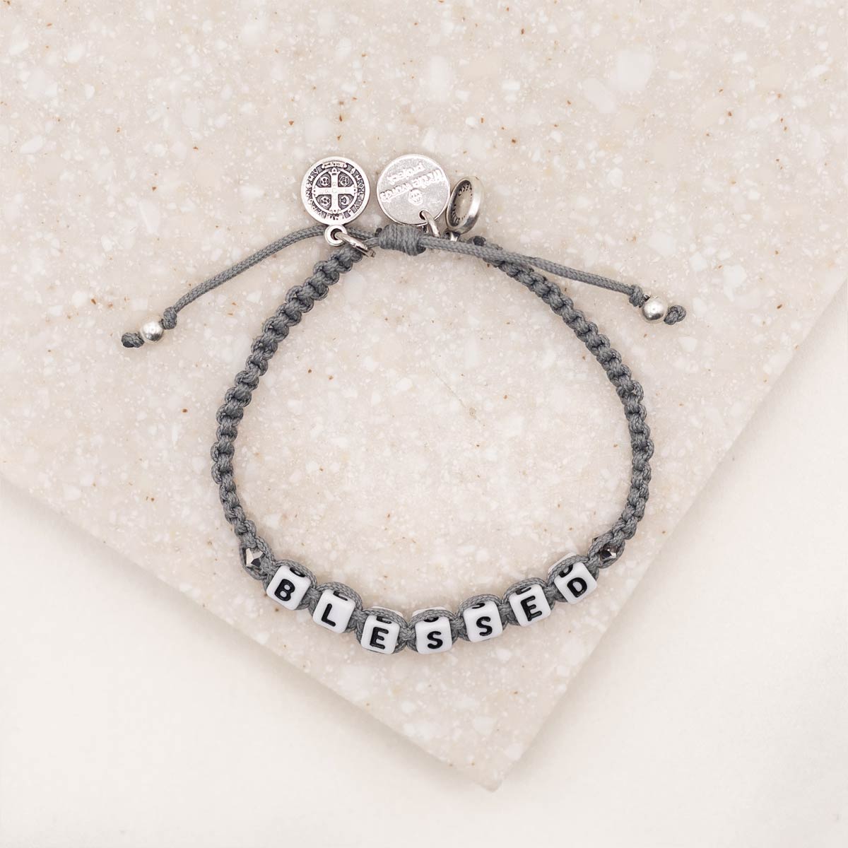 slate silver overhead shot of My Saint My Hero Little Words Project Blessed Bracelet