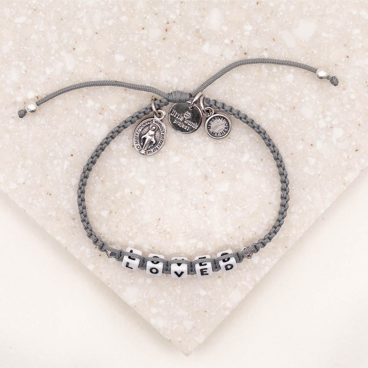 overhead of slate silver Little Words Project and My Saint My Hero Loved Bracelet