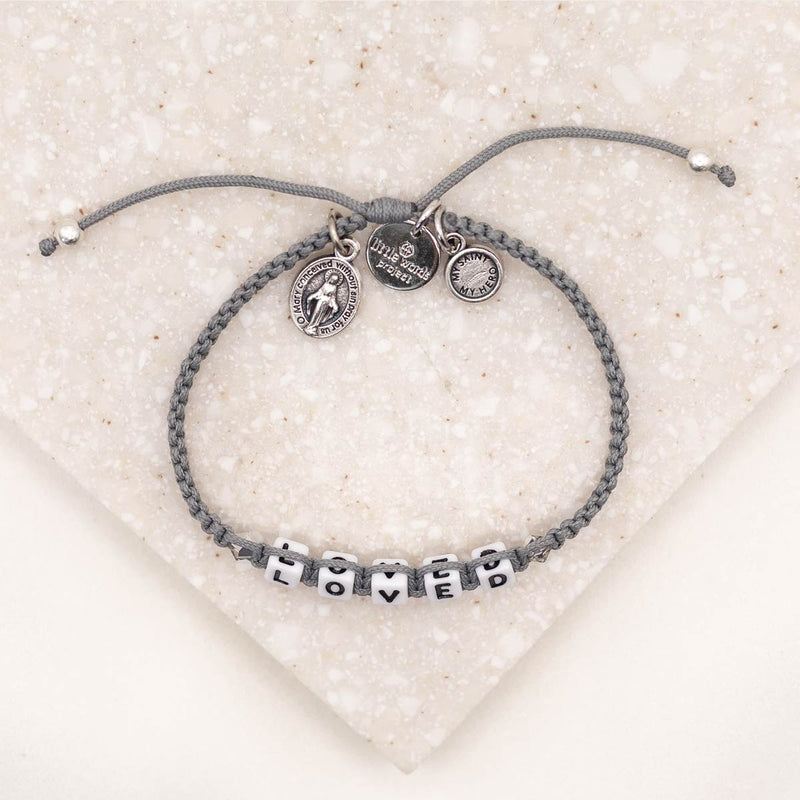 overhead of slate silver Little Words Project and My Saint My Hero Loved Bracelet
