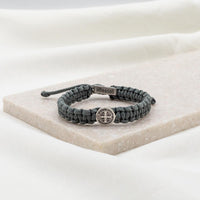 bracelet with slate cording with  silver tone Benedictine Medal and blessed tag