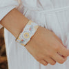 I Believe Cuff close up on wrist on person wearing white
