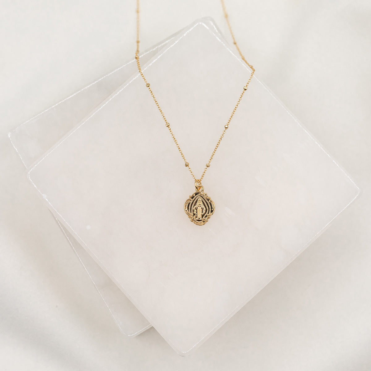 Gold Mary Medal on a petite gold dipped station chain