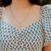 woman wearing the 18" small Benedictine Gold Medal Necklace