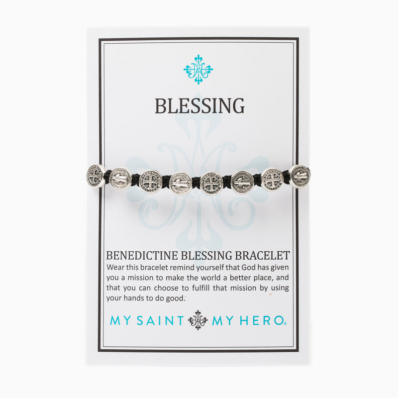 A black cording with silver St. Benedict prayer chaplet style Benedictine Blessing Bracelet on a My Saint My Hero Inspirational Card