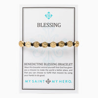 Benedictine Blessing Bracelets come on an inspirational card with the story of the Benedictine Medal of protection
