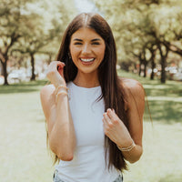 Madi Prewet in the Esther 4:14 Bracelets she designed in collaboration with My Saint My Hero