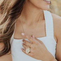 Lourdes Miraculous Mary Necklace on young woman