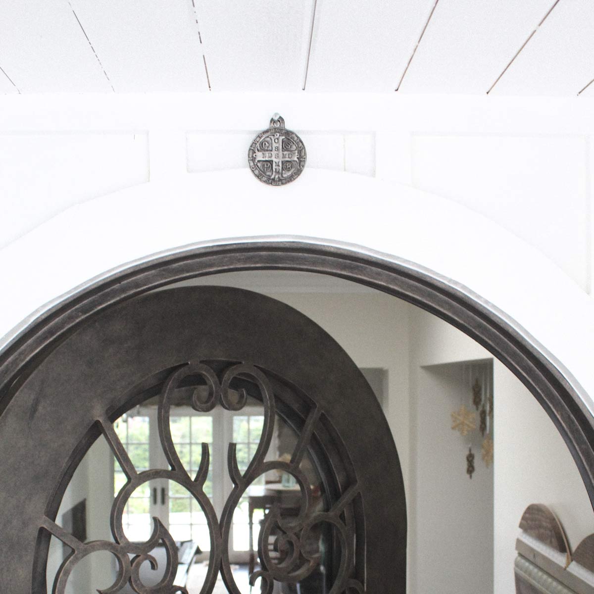 House Blessing Medallion - Saint Benedict Medal Hanging Over Front Door of Home