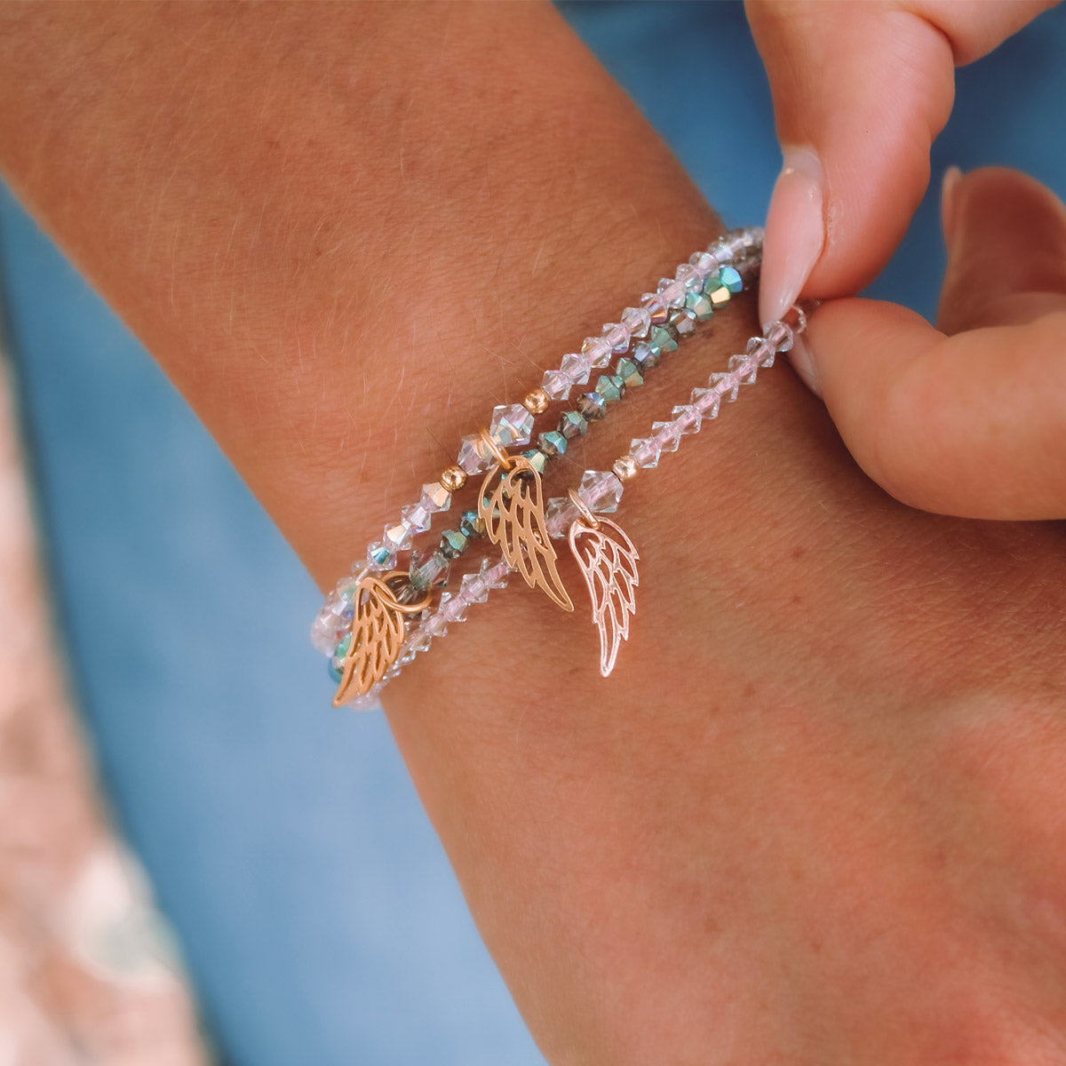 Premium Crystal pink and gray beaded bracelets with angel wing charms