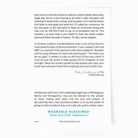 Benedictine Blessing Bracelets come on an inspirational card with the story of the Benedictine Medal of protection