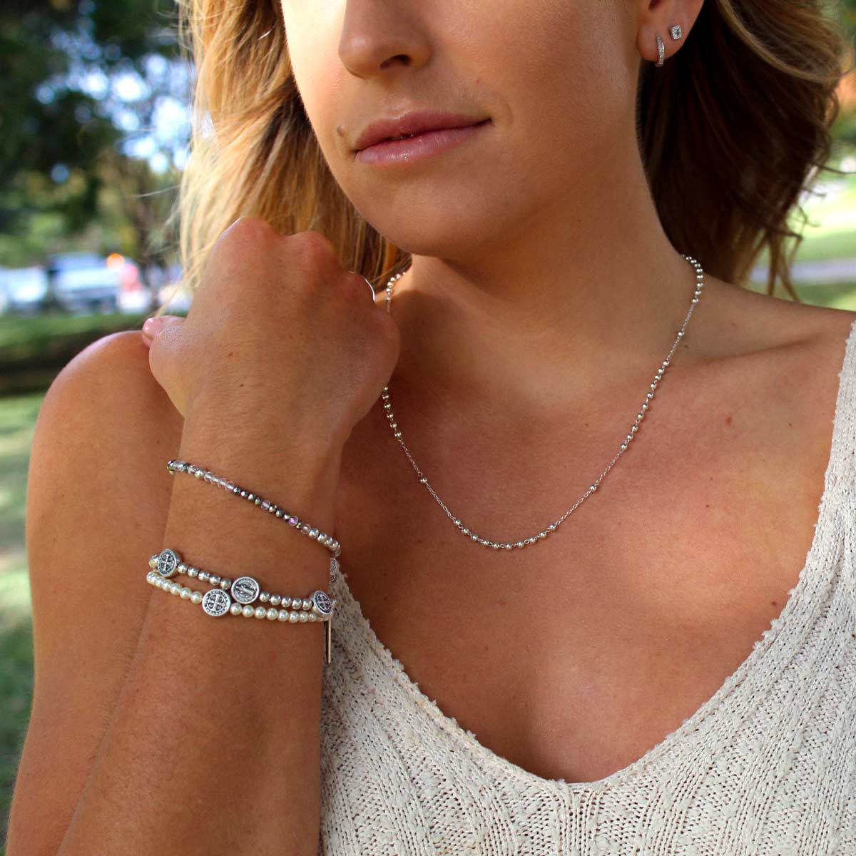 Woman wearing Benedictine Birthday Blessing Bracelets
