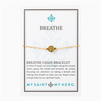 dainty gold chain st. benedict medal breathe bracelet on a inspirational card