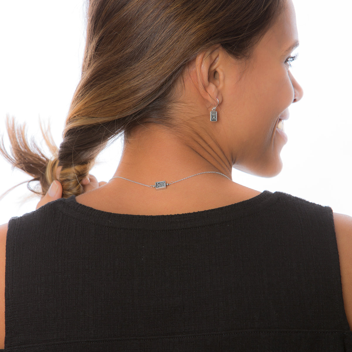 Back of Garment of Grace Petite Scapular Necklace on Model