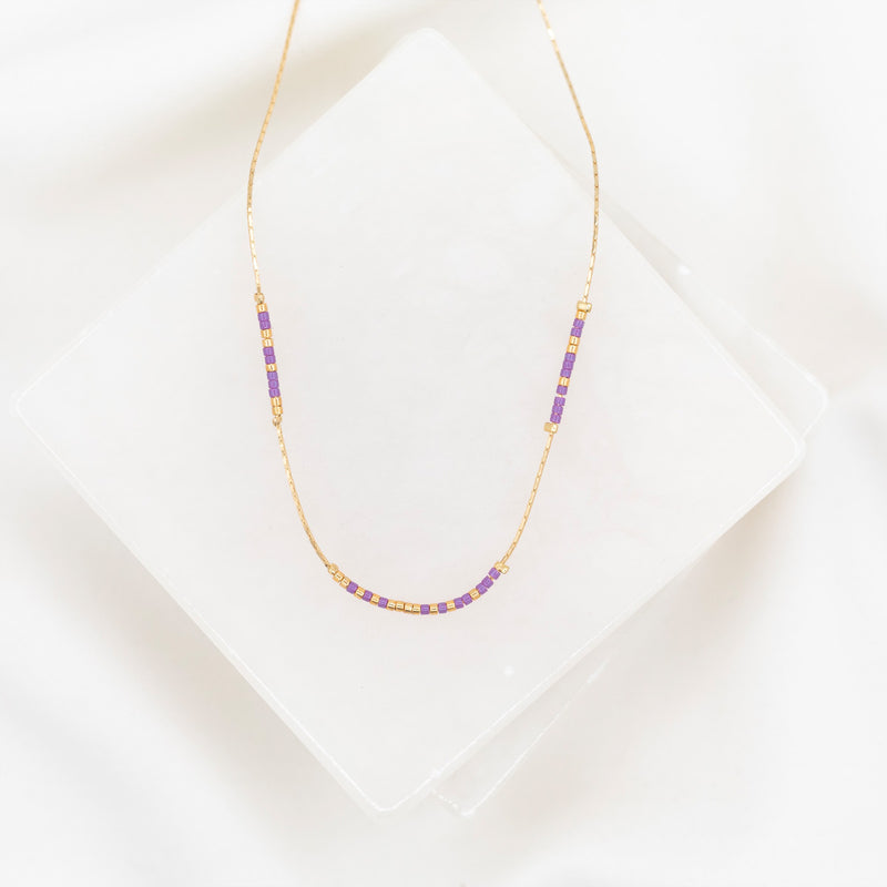 Purple and gold glass bead and gold-tone chain necklace