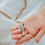 close up of Olive Wood and Amazonite Medjugorje Rosary in a hand