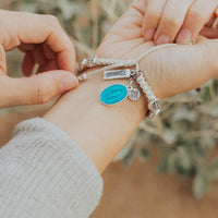 Miraculous Mary Blue Enamel Medal on woven bracelet