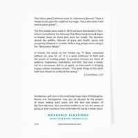 the back of the Miraculous Blessing Bracelet card with the story of the Miraculous Medal and 1 Corinthians 1:27 Bible Verse