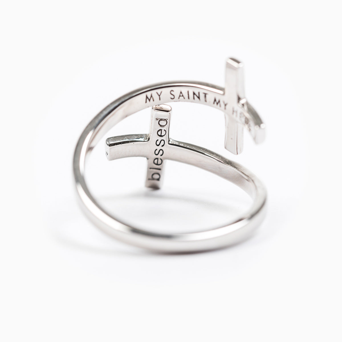 the inside of the My Saint My Hero Pillar of Faith ring with the word blessed engraved inside the cross